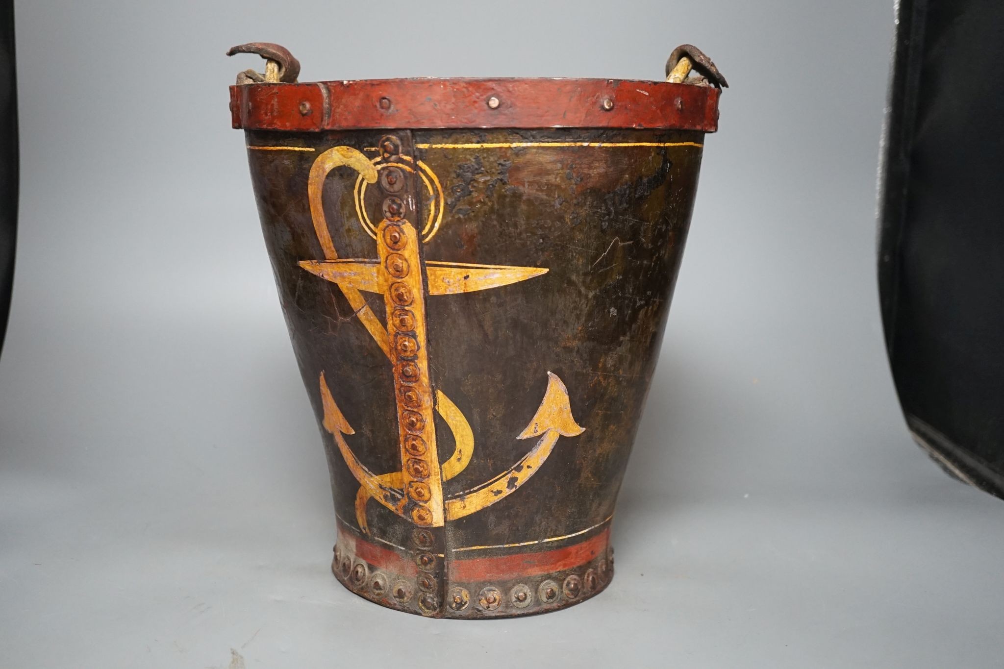 A painted leather fire bucket, later decorated ‘Government House Gibralter’ 27cm